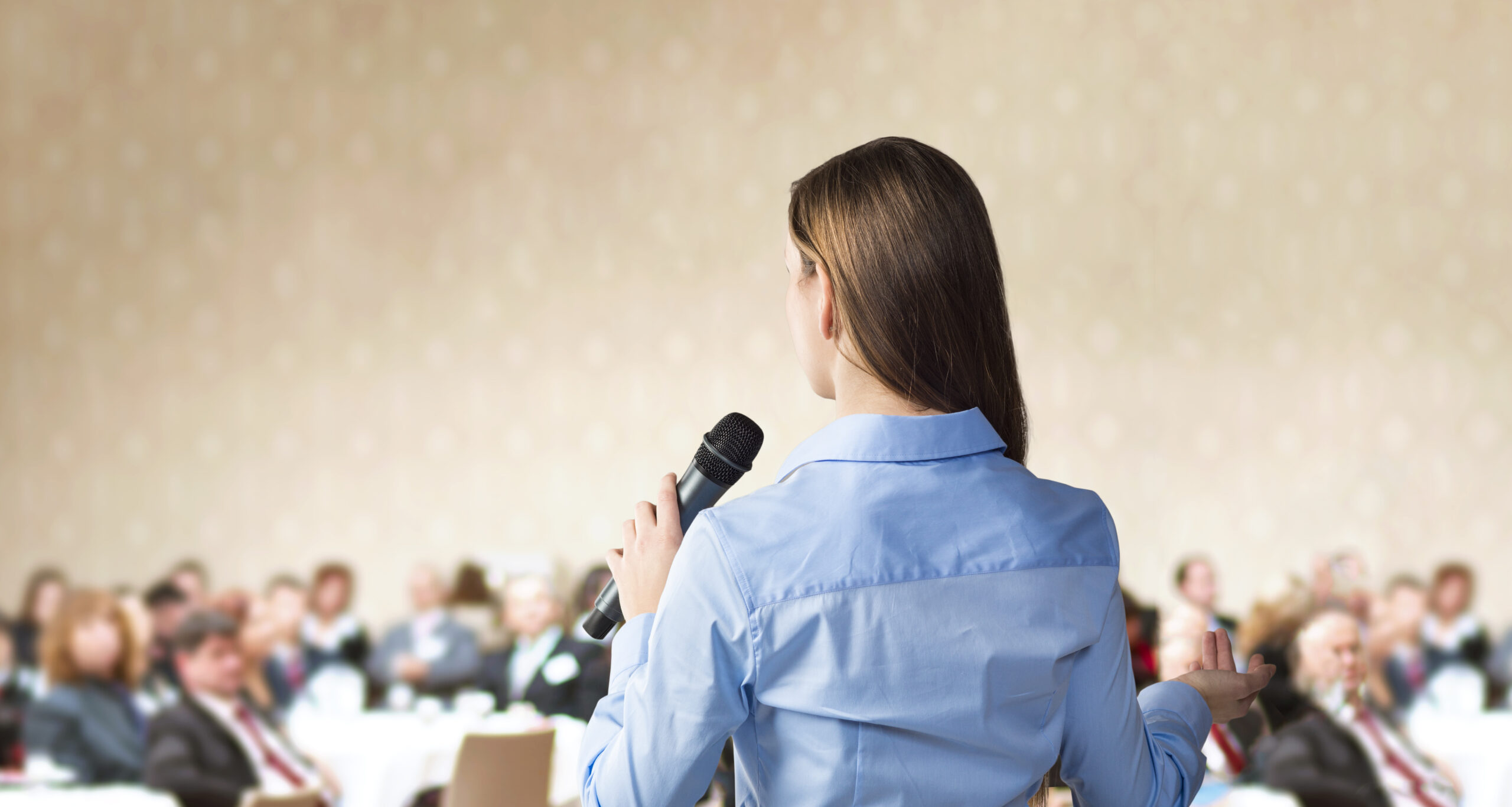 Woman speaking at conference